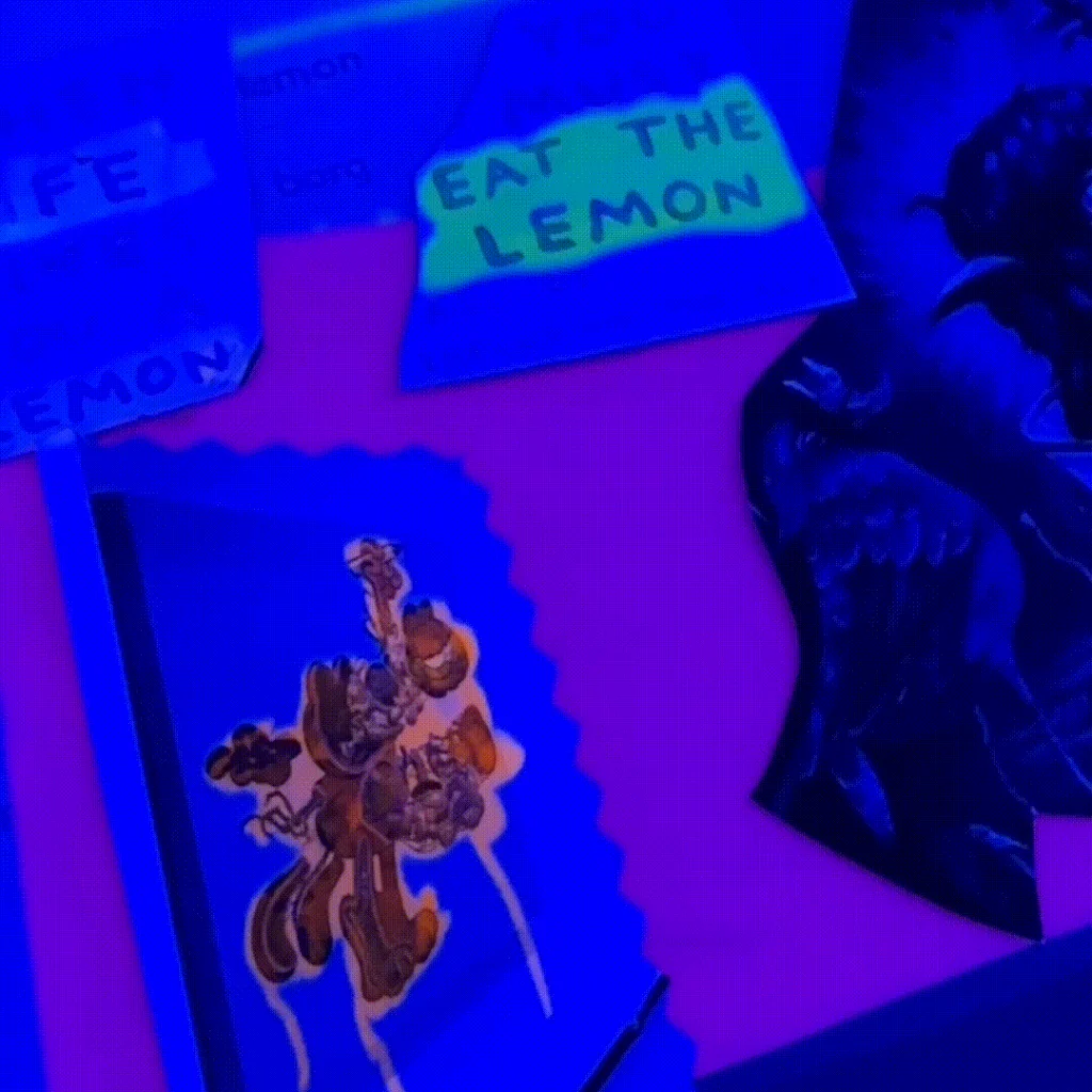 flashing art collage reads 'eat the lemon', visual of garfield anatomy, bird